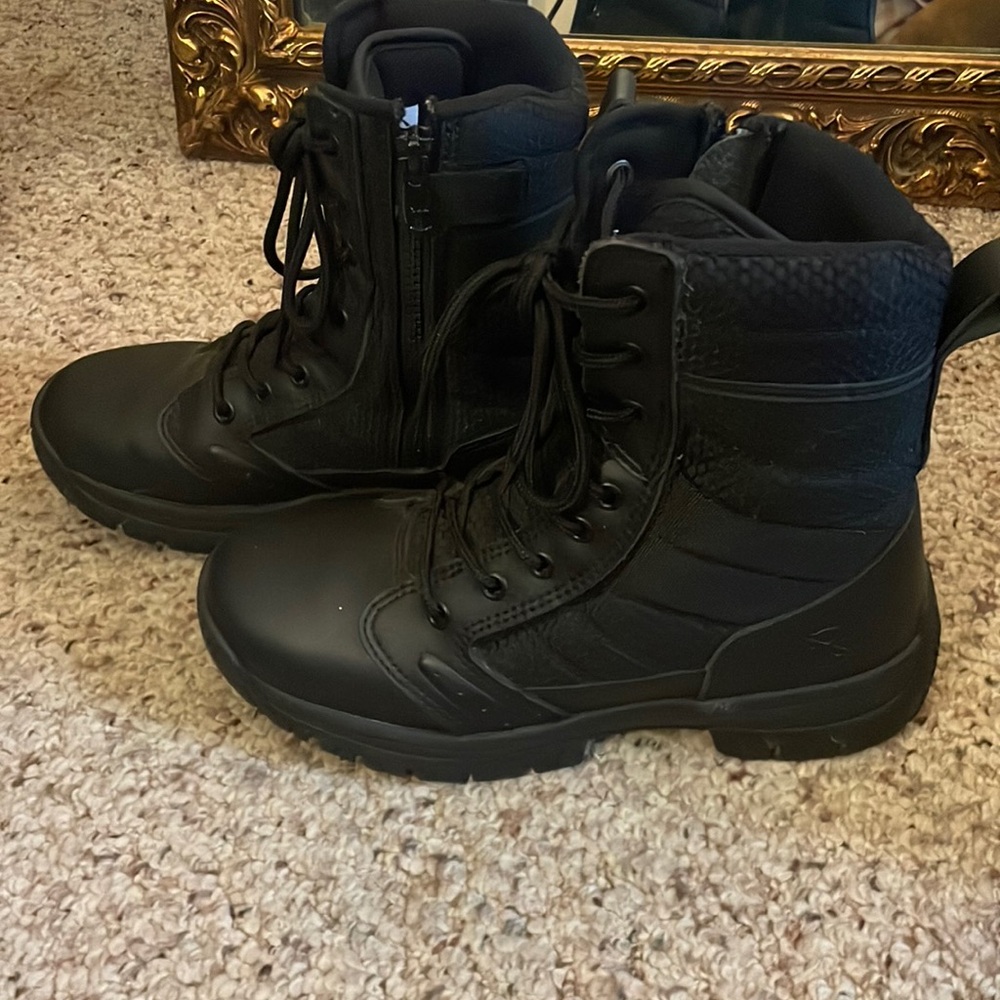 Women’s black tactical boots. Slip resistant. Excellent used condition.